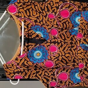 Wrap front culotte jumpsuit.